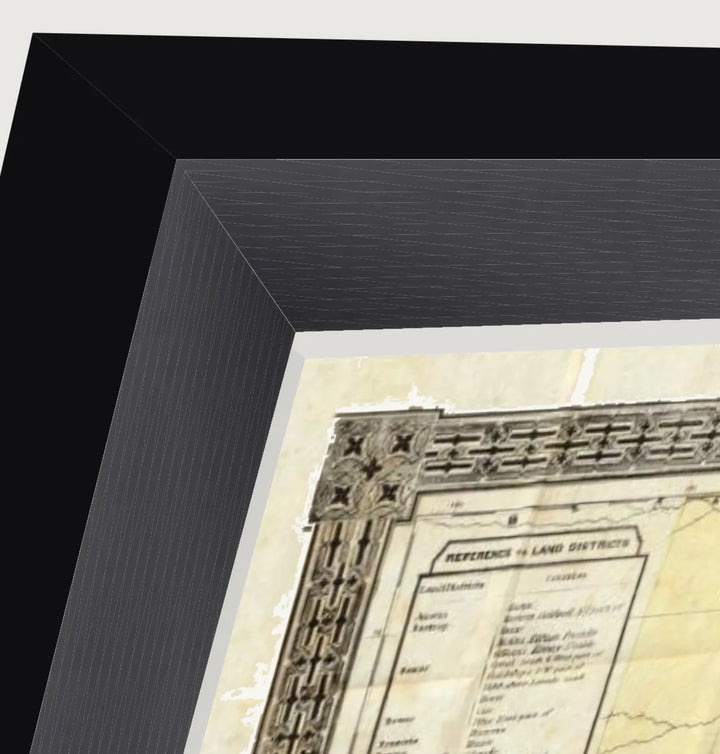 Float mount frame with a print raised on spacers, showing the deckled paper edge and shadow gap