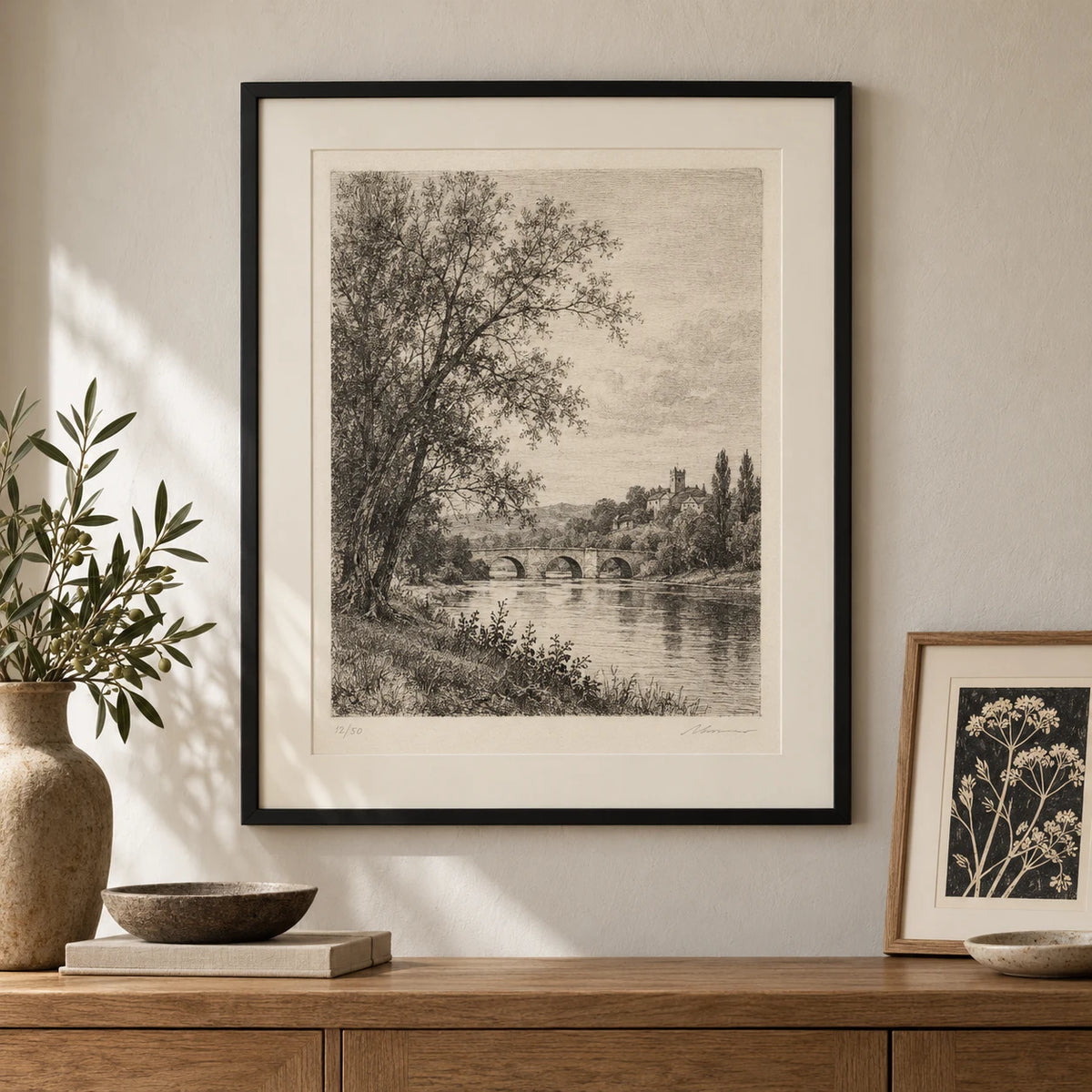 Signed and numbered landscape etching in a slim black frame with a white window mount showing the plate mark and pencil signature