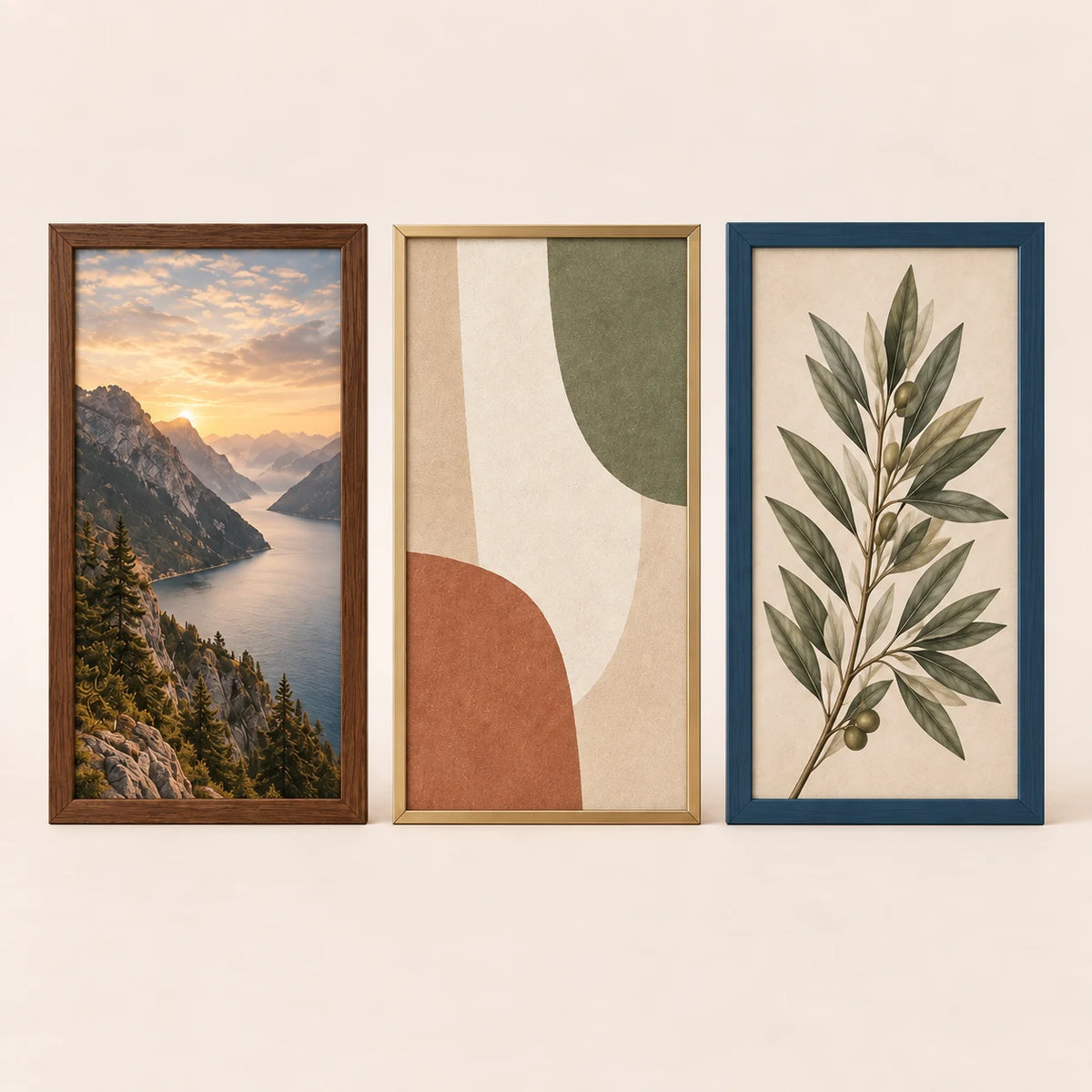 Three 18 by 28 inch picture frames in walnut, champagne brass and slate blue finishes with varied artwork