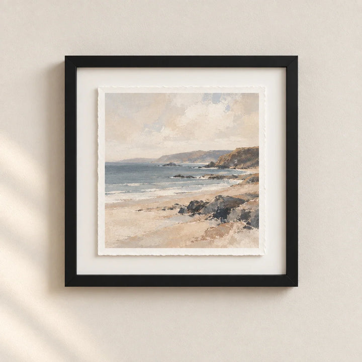 A deckle-edged coastal art print float mounted in a deep black gallery frame