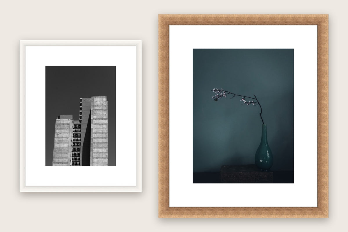 Two made-to-measure frames with deep mat boards — a white wood A4 and a bronze 30x40cm