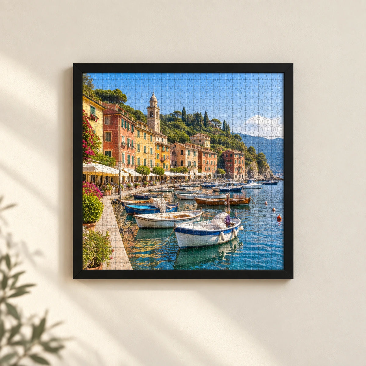 A completed harbour jigsaw puzzle displayed in a black picture frame