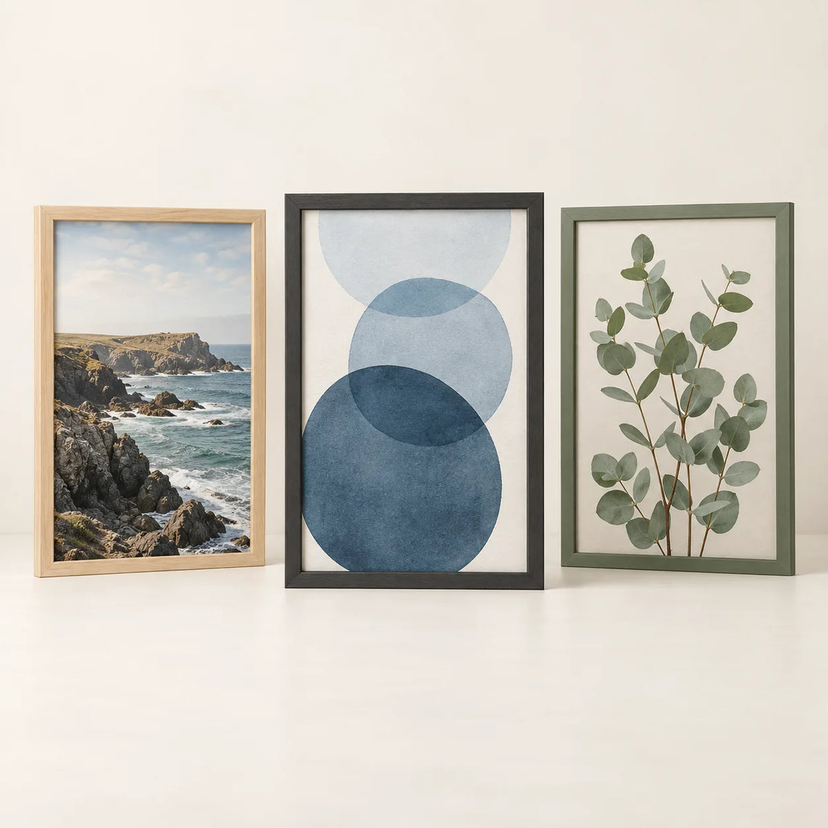 Three picture frames illustrating the 16 by 24 inch size
