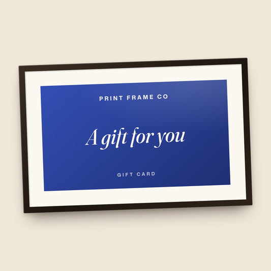 Print Frame Co gift card in a black frame with the words A gift for you